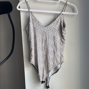 Gaze Asymmetrical Black and White Sleeveless Bodysuit